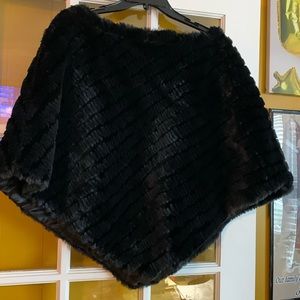 Black fur poncho.